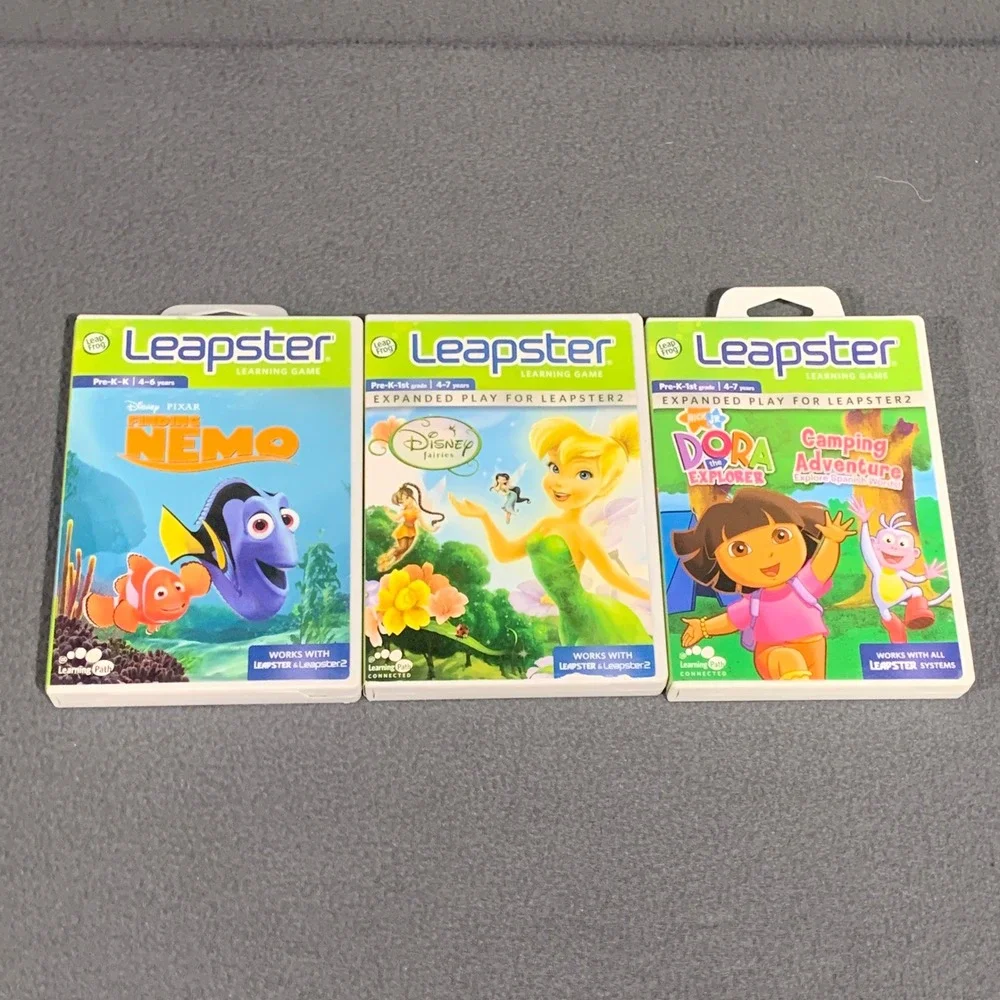 LeapFrog Leapster Games Lot of‎ 3 Finding Nemo Disney Fairies Dora Explorer Case